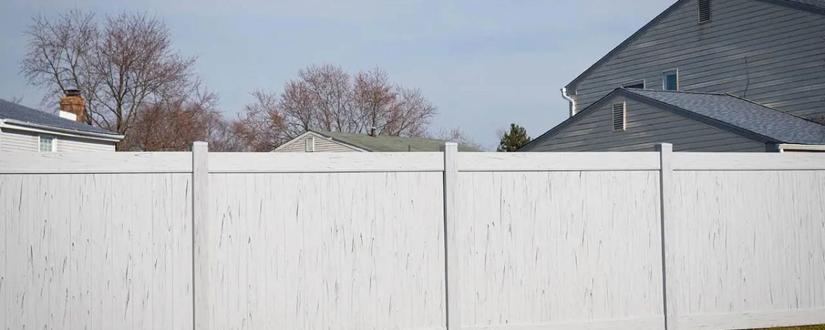 Wood and vinyl residential fencing installed by Nationwide Roofing Co. in Sequim, Washington