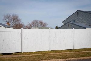 Wood and vinyl residential fencing installed by Nationwide Roofing Co. in Sequim, Washington