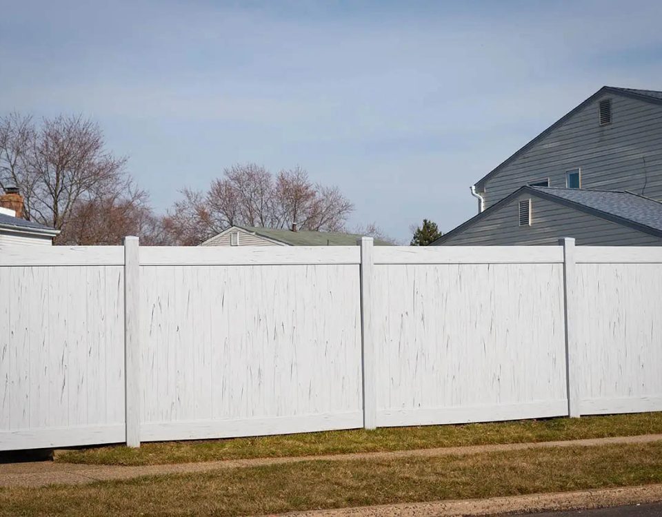 Wood and vinyl residential fencing installed by Nationwide Roofing Co. in Sequim, Washington