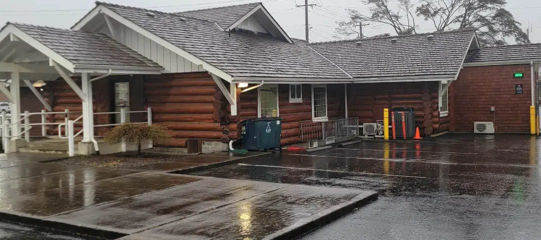 Home in Port Angeles, Washington after winter rain illustrating why spring roof inspections are important.