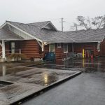Home in Port Angeles, Washington after winter rain illustrating why spring roof inspections are important.