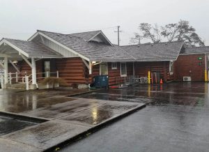 Home in Port Angeles, Washington after winter rain illustrating why spring roof inspections are important.