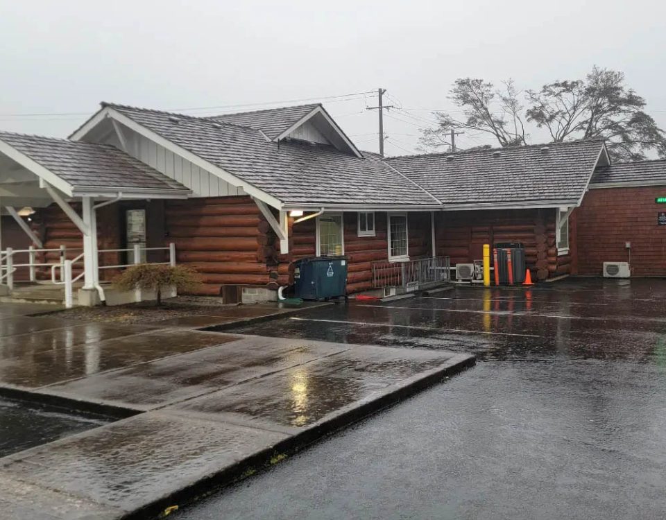 Home in Port Angeles, Washington after winter rain illustrating why spring roof inspections are important.